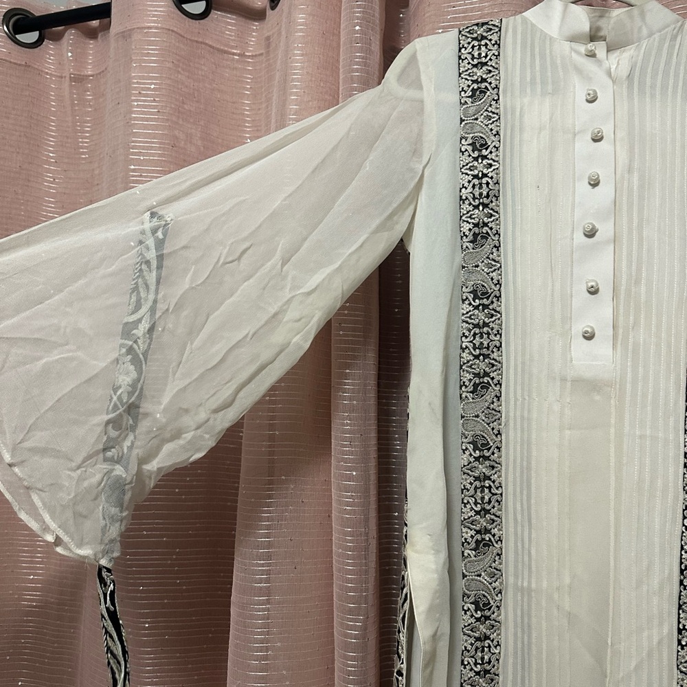 Elegant White Sheer Sleeve Outfit